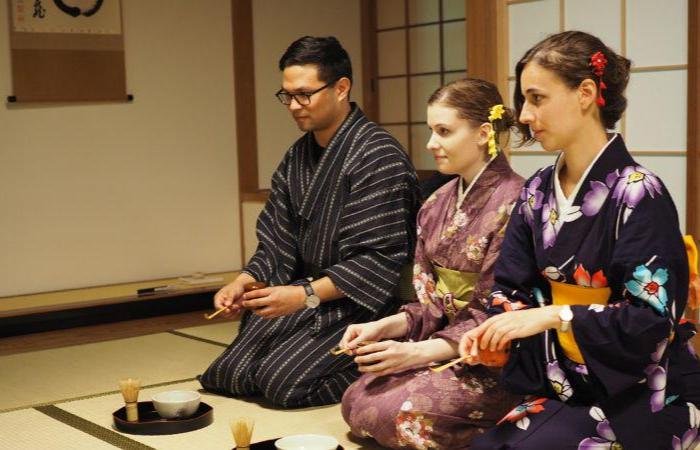 People taking part in a Japanese tea ceremony